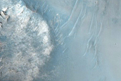 Layered Bedrock and Bedforms in Flaugergues Crater
