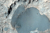 Light-Toned Layered Deposits on Northern Edge of Hellas Planitia