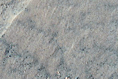 Triangular Scars on Hillslopes