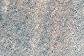 Triangular Scars on Hillslopes
