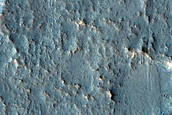 Fault Scarp and Mounds near Claritas Rupes