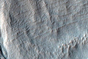 South-Facing Gullies in Mantle Above Concentric Crater Fill