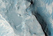 Layered Bedrock and Bedforms in Flaugergues Crater