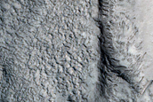 Channel Moving around Crater in Northern Mid-Latitudes