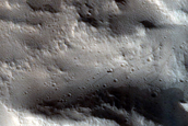 North-Pole-Facing Deposit in Crater Associated with Headwall Erosion