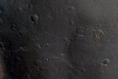 Light-Toned Material and Crater Layering near Trouvelot Crater