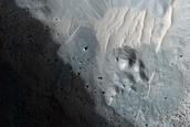 Crater-Related Pitted Materials in 3-Kilometer Crater in Nepenthes Planitia