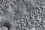 Boulders on Lobate Debris Apron Associated with Ice Flow Convergence