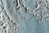 Possible Gully-Associated Light-Toned Material Northeast of Argyre Planitia