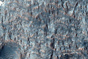 Light-Toned Layered Deposits on Northern Edge of Hellas Planitia