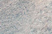 Triangular Scars on Hillslopes
