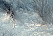 Slope Features on Orson Welles Crater Wall