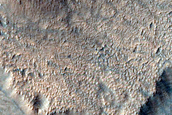 Small Crater in Eroded Terrain