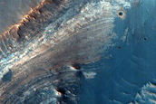 Exposed Layers in Small Crater in Arabia Terra
