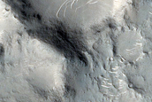 Ridge Interacting with Craters in Isidis Planitia