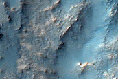Light-Toned Layered Deposits on Northern Edge of Hellas Planitia