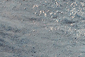 Triangular Scars on Hillslopes
