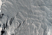 Layered Bedrock and Yardangs in Degraded Arabia Terra Crater