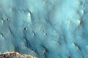 Possible Gully-Associated Light-Toned Materials in Noachis Terra