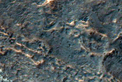 Light-Toned Layered Deposits on Northern Edge of Hellas Planitia
