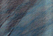 Triangular Scars on Hillslopes