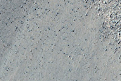 Triangular Scars on Hillslopes
