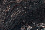 Light-Toned Layered Deposits on Northern Edge of Hellas Planitia