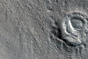 Crater in Galaxias Fossae