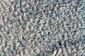 Layers around Mesa in Hellas Planitia
