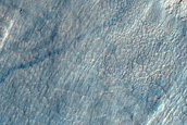 Triangular Scars on Hillslopes