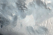 Crater-Related Pitted Materials in 3-Kilometer Crater in Nepenthes Planitia