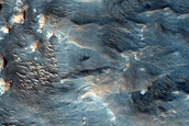 Light-Toned Rock Outcrops and Other Features in Libya Montes