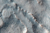 Irregular Cellular Structures on Crater Floor East of Icaria Fossae
