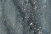 Channel Cutting Wrinkle Ridge in Promethei Terra