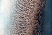 Dunes with Erosionally-Resistant Layers in Ross Crater