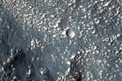 Dark Outcrop in Eastern Hellas Montes