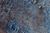 Possible Olivine-Rich Materials on Plains South of Martin Crater