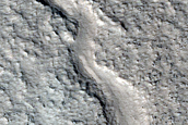 Curved Channel West of Moreux Crater