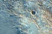 Crater with Eroded Layered Ejecta