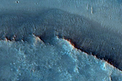 Fluvial Channels in Layered Impact Ejecta