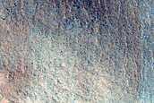 Layered Features in Craters in Northern Plains