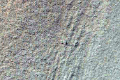 Triangular Scars on Hillslopes