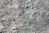 Candidate New Impact Site with Possible Ice
