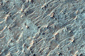 Olivine-Bearing Materials in Southern Huygens Crater