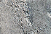 Streamlined Shape in Valley in Nilosyrtis Mensae