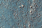 Small Crater North of Argyre Region Filled with Ejecta from Hale Crater