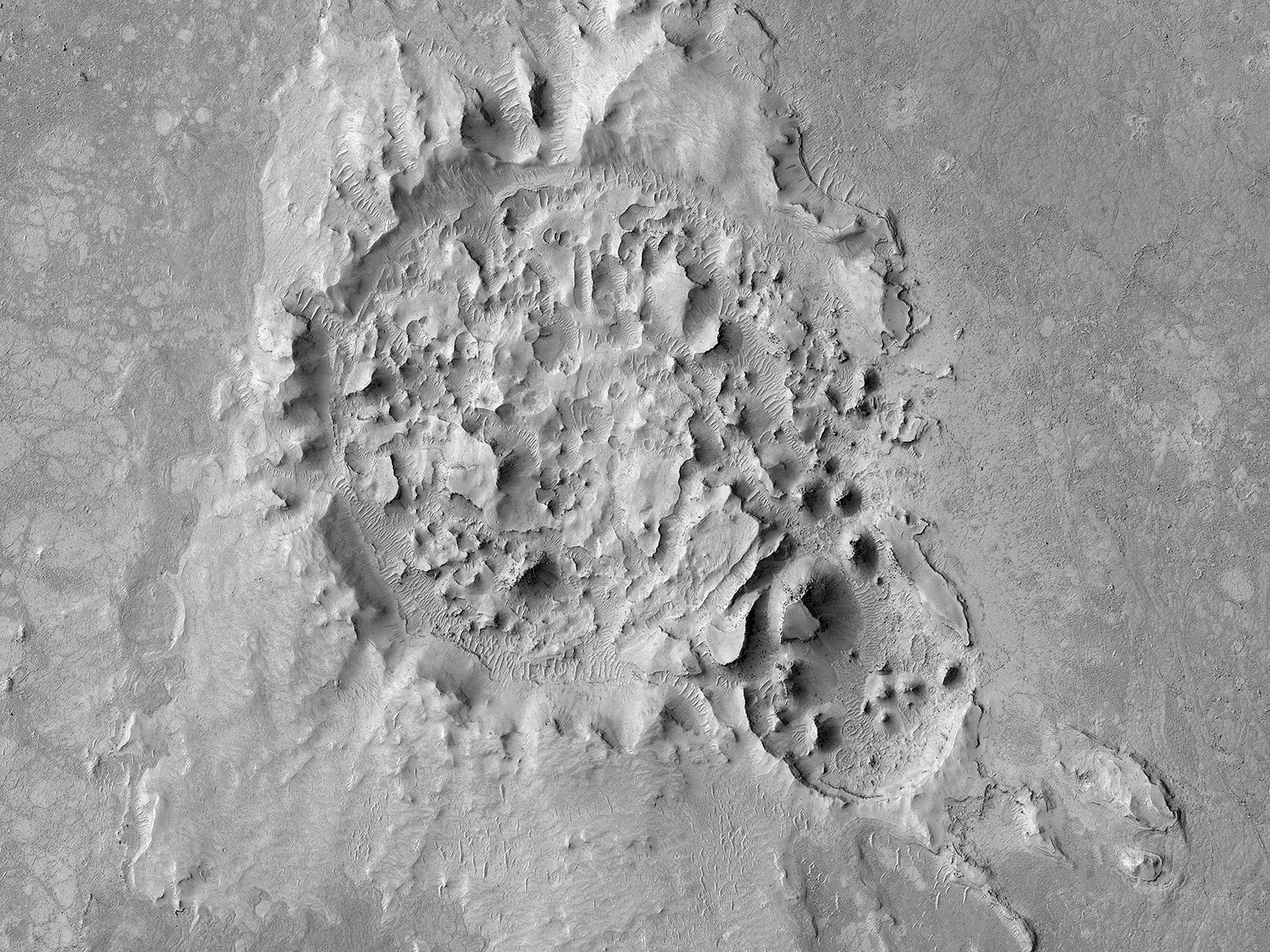 HiRISE | A Highly Disrupted Crater (ESP_051147_1830)